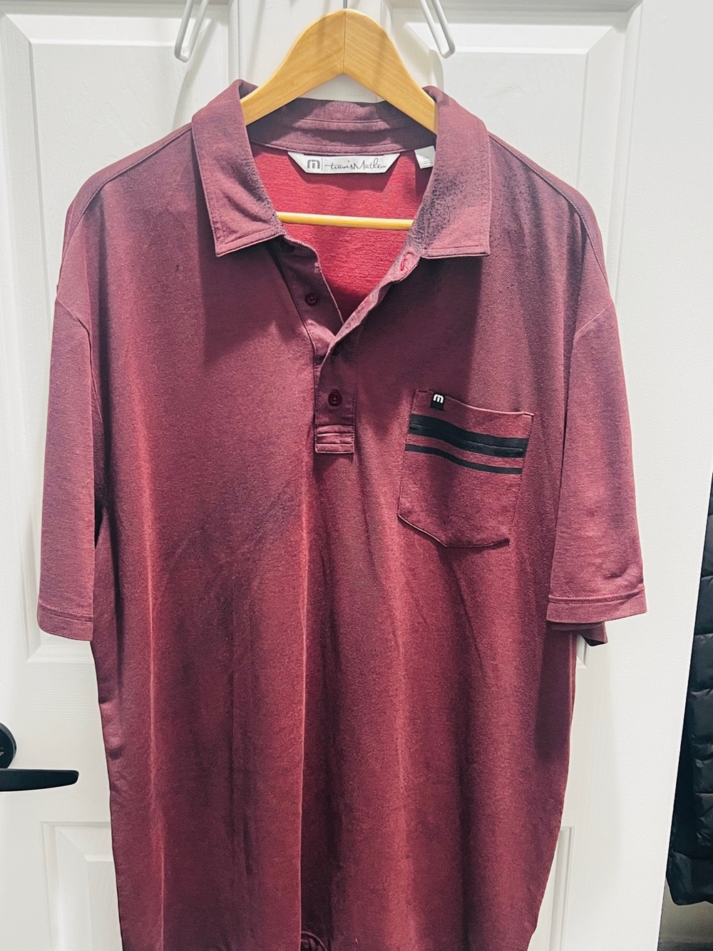 Travis Mathew Maroon Polo with Chest Pocket Stripe